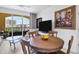 Dining area with hardwood floors and balcony view at 345 Bayshore Blvd # 706, Tampa, FL 33606