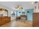 Spacious bedroom with wood furniture and light blue walls at 365 Oak Hill Way # 32, Sarasota, FL 34232