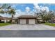 Two-car garage, and a double-wide driveway at 365 Oak Hill Way # 32, Sarasota, FL 34232