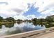 Serene lake view with fountain in community at 365 Oak Hill Way # 32, Sarasota, FL 34232