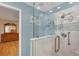 Large walk-in shower with glass enclosure and modern fixtures at 365 Oak Hill Way # 32, Sarasota, FL 34232