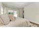 Spacious bedroom with sliding glass doors opening to a patio at 3761 Founders Club Dr, Sarasota, FL 34240