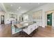 Spacious dining area with a large table, adjacent to a modern kitchen at 3761 Founders Club Dr, Sarasota, FL 34240