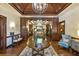 Elegant community clubhouse lobby with wood accents and comfortable seating at 3761 Founders Club Dr, Sarasota, FL 34240