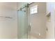 Elegant shower with glass enclosure and marble flooring at 3761 Founders Club Dr, Sarasota, FL 34240