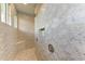 Spa-like shower with patterned tile and built-in seat at 3761 Founders Club Dr, Sarasota, FL 34240