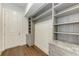 Functional storage room with built-in shelving and cabinets at 3761 Founders Club Dr, Sarasota, FL 34240