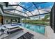 Stunning pool and spa with covered lanai and golf course views at 3761 Founders Club Dr, Sarasota, FL 34240