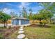 Backyard features a newly constructed shed and patio at 3902 11Th W Ave, Bradenton, FL 34205