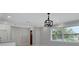 Bright dining room with hardwood floors and chandelier at 3902 11Th W Ave, Bradenton, FL 34205