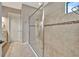 Spa-like bathroom with large walk-in shower and neutral tile at 4020 Cascina Way, Sarasota, FL 34238