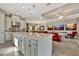 Open concept kitchen with large island, stainless steel appliances, and white cabinets at 4020 Cascina Way, Sarasota, FL 34238