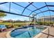 Inviting screened pool with a fountain and spacious deck at 4020 Cascina Way, Sarasota, FL 34238