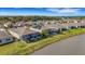 Aerial view of homes with private pools and lanais at 4110 Mossy Limb Ct, Palmetto, FL 34221