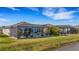 View of backyard oasis with screened lanai and pool at 4110 Mossy Limb Ct, Palmetto, FL 34221