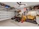 Organized garage workshop, complete with workbenches and ample storage at 4110 Mossy Limb Ct, Palmetto, FL 34221