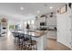 Modern kitchen featuring granite countertops and gray cabinets at 4110 Mossy Limb Ct, Palmetto, FL 34221