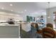 Spacious kitchen with white cabinetry, breakfast nook, and views to the Gathering room at 4452 Mcintosh Lake Ave, Sarasota, FL 34233