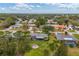 Aerial view of neighborhood, showcasing homes and landscape at 5006 W Country Club Dr, Sarasota, FL 34243