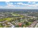 Aerial view of a residential neighborhood with golf course at 5006 W Country Club Dr, Sarasota, FL 34243