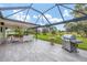 Large screened patio with golf course views at 5006 W Country Club Dr, Sarasota, FL 34243