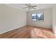 Spacious bedroom with wood flooring and ceiling fan at 5310 26Th W St # 501, Bradenton, FL 34207