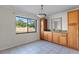 Kitchen dining area with wood cabinets and tile floors at 5310 26Th W St # 501, Bradenton, FL 34207