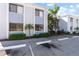 Condo building with parking and tropical landscaping at 5310 26Th W St # 501, Bradenton, FL 34207