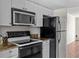 Kitchen with granite countertops and appliances at 5310 26Th W St # 501, Bradenton, FL 34207