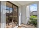 Screened porch with sliding glass doors leading inside at 5310 26Th W St # 501, Bradenton, FL 34207