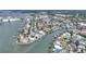 Aerial view showing home's waterfront location and surrounding neighborhood at 542 Baywood S Dr, Dunedin, FL 34698