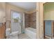 A bathroom renovation with new shower and tub at 542 Baywood S Dr, Dunedin, FL 34698