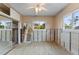 Under renovation: Bedroom with new flooring and exposed walls at 542 Baywood S Dr, Dunedin, FL 34698