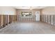 Under renovation: Living area with new flooring and exposed walls at 542 Baywood S Dr, Dunedin, FL 34698