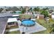 Above ground pool with patio and surrounding yard at 542 Baywood S Dr, Dunedin, FL 34698