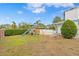 Spacious backyard with playground and lush landscaping at 5420 4Th Avenue Nw Dr, Bradenton, FL 34209