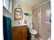 Bathroom with shower, toilet and vanity at 5885 17Th W St # B21, Bradenton, FL 34207