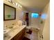 Full bathroom with shower/tub combo and updated vanity at 5885 17Th W St # B21, Bradenton, FL 34207