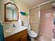 Clean bathroom with shower, toilet, and vanity at 5885 17Th W St # B21, Bradenton, FL 34207