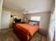 Bedroom with a double bed and wood furniture at 5885 17Th W St # B21, Bradenton, FL 34207