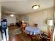 Combined living and dining area with wood floors at 5885 17Th W St # B21, Bradenton, FL 34207