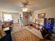 Living room with ample seating and carpet at 5885 17Th W St # B21, Bradenton, FL 34207