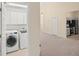 Convenient laundry room with washer and dryer included at 6234 Sturbridge Ct, Sarasota, FL 34238