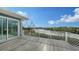 Relaxing balcony with water views and modern design at 625 Jackson Way, Longboat Key, FL 34228