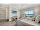 Bright bedroom with king bed and balcony access at 625 Jackson Way, Longboat Key, FL 34228