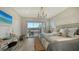 Main bedroom with water views and king-size bed at 625 Jackson Way, Longboat Key, FL 34228