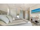 Serene bedroom with king-size bed and water views at 625 Jackson Way, Longboat Key, FL 34228