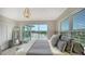 Main bedroom with water views and access to private balcony at 625 Jackson Way, Longboat Key, FL 34228