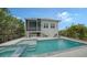 Stunning pool and spa with patio and home views at 625 Jackson Way, Longboat Key, FL 34228