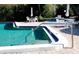 Refreshing swimming pool with ample deck space and seating at 6440 Mourning Dove Dr # 101, Bradenton, FL 34210